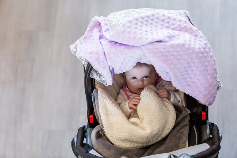 Baby car seat cover providing sun and weather protection for infant carrier