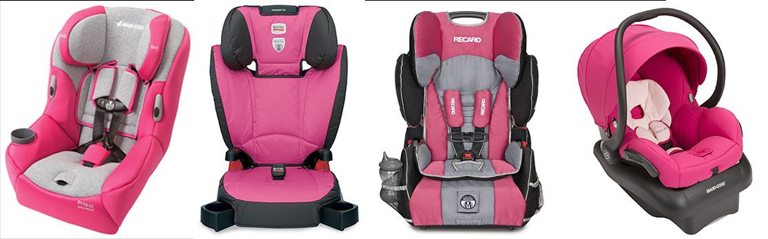 Pink infant car seat with floral pattern in rear-facing vehicle installation