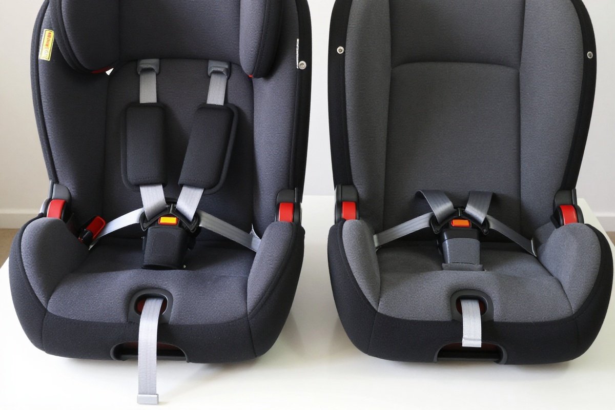 Two car seat bases compared showing one with anti-rebound bar and one standard