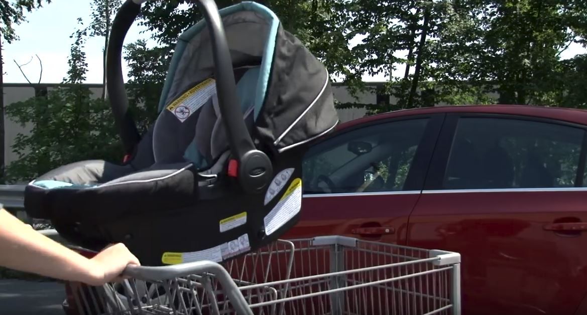 Infant car seat properly placed in shopping cart