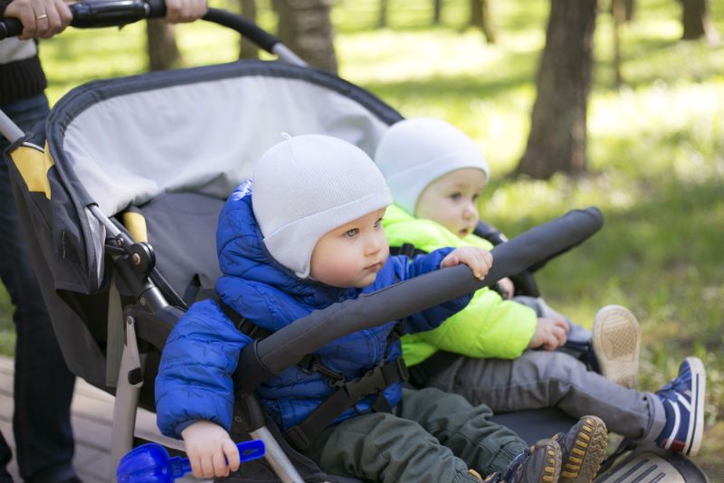 Jogging stroller with large air-filled tires and fixed front wheel for running